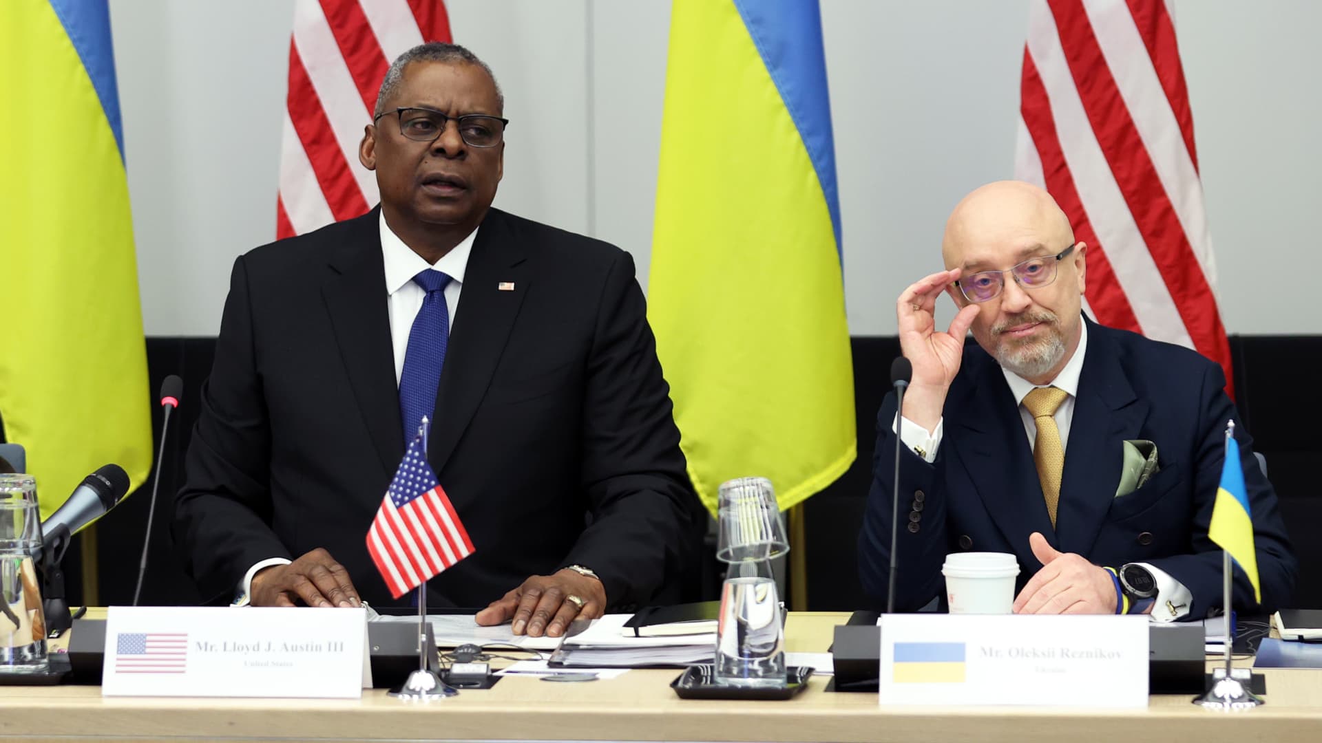 US Defence Secretary Lloyd J. Austin III (L) and Ukrainian Defence Minister Oleksii Reznikov (R) attend the Ukraine defence contact group meeting at NATO headquarters during the first of two days of defence ministers' meetings on February 14, 2023 in Brussels, Belgium.