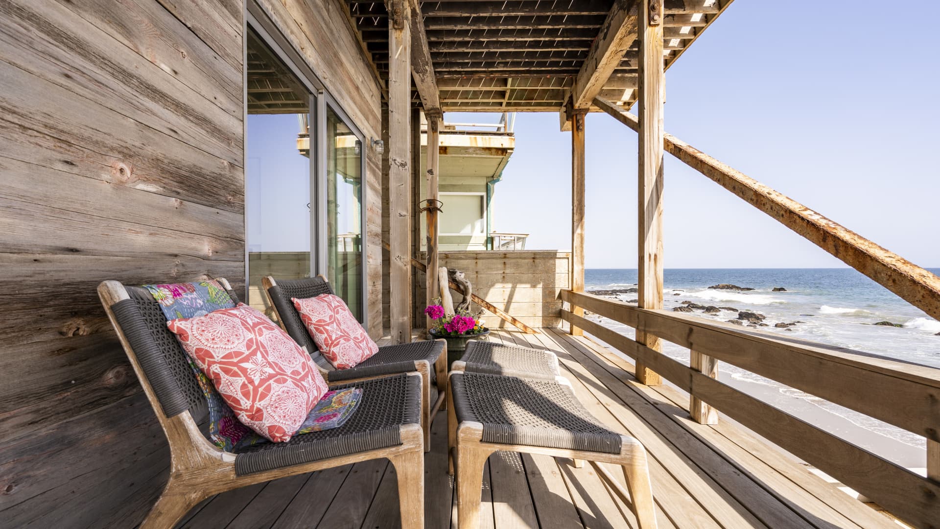 This beachfront apartment accommodates two guests and is in Malibu, California.