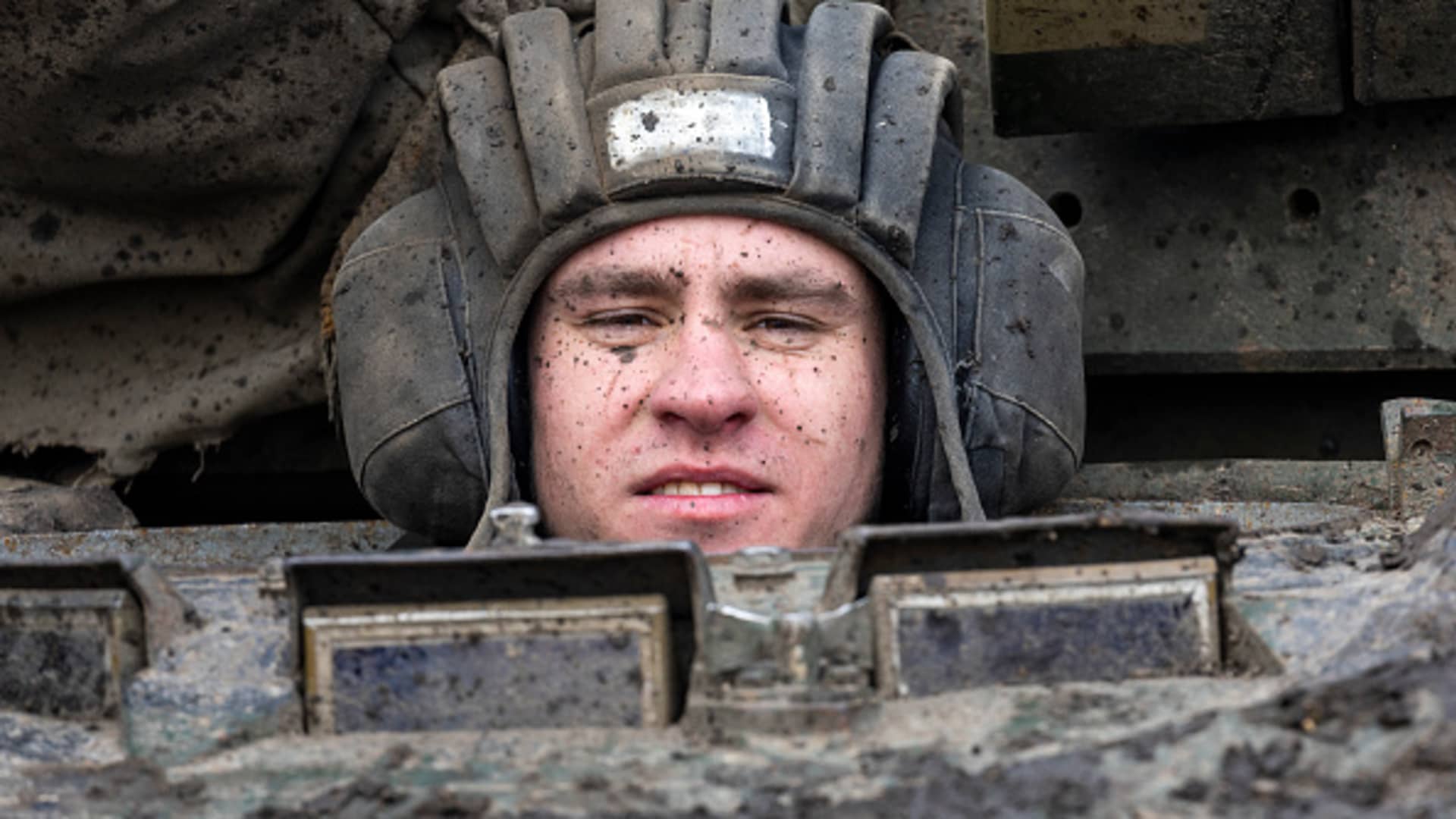 A Ukrainian Marine returns his crew's T-80 tank to his unit's dug in position on February 15, 2023 in the Donbass region of eastern Ukraine. 