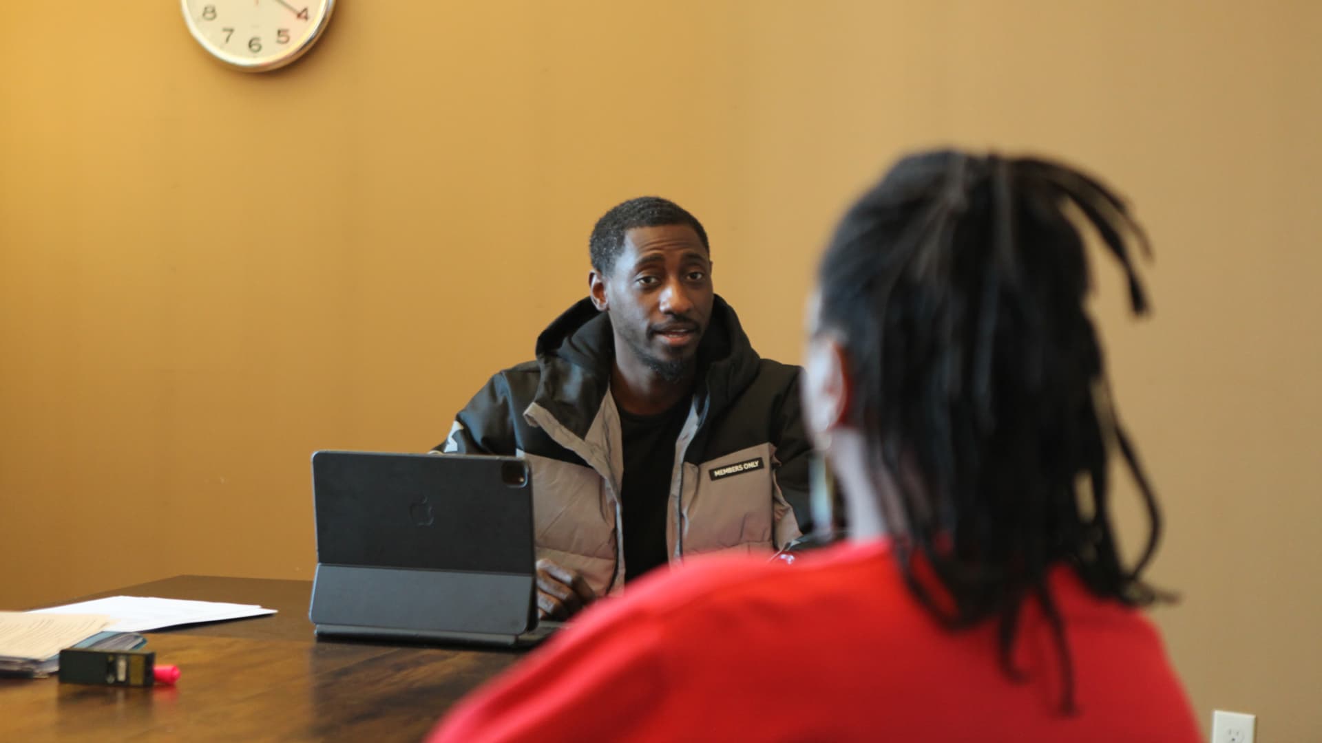 Tahir Johnson interviews a prospective employee ahead of his dispensary's opening next month. His goal is to 45 employees for part time and full time roles.
