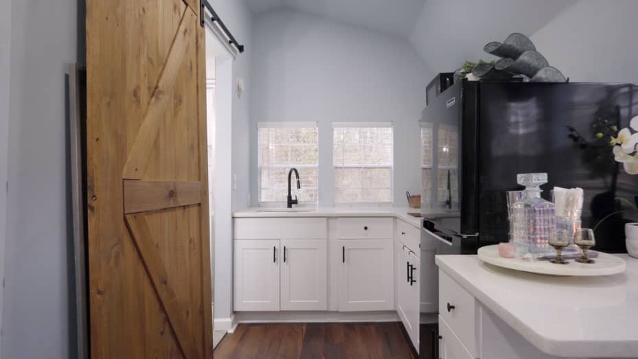 The rustic barn sliding doors provide easy privacy.