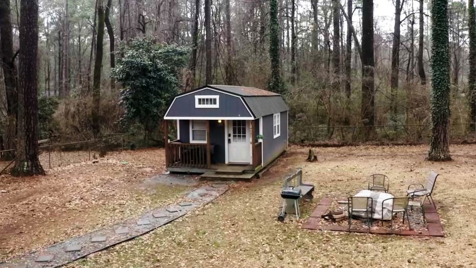 Precious' tiny home sits in the back corner of her 7,280 sq. ft. backyard.