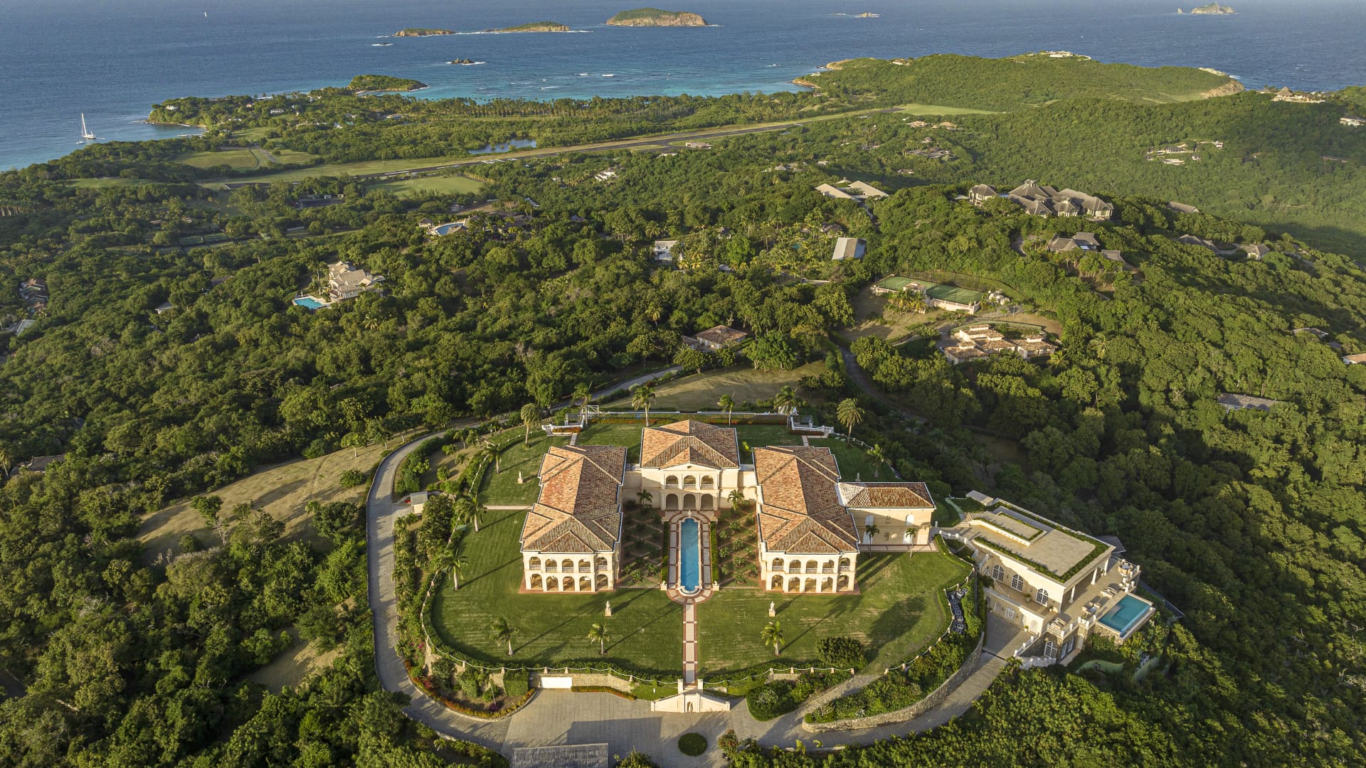 The estate sits atop Endeavor Hill, one of Mustique's highest summits.