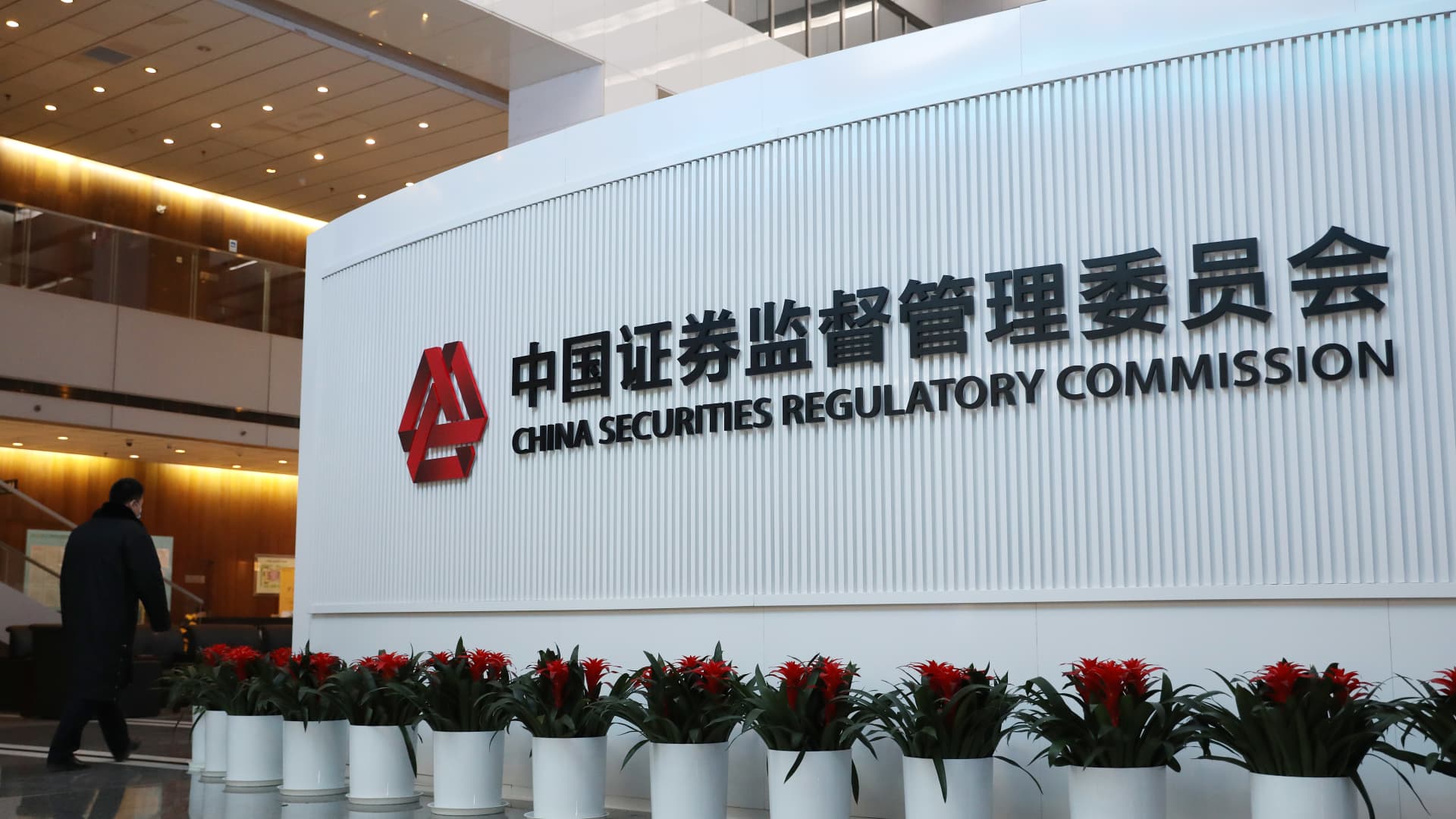 Photo of China formalizes rules for overseas IPOs