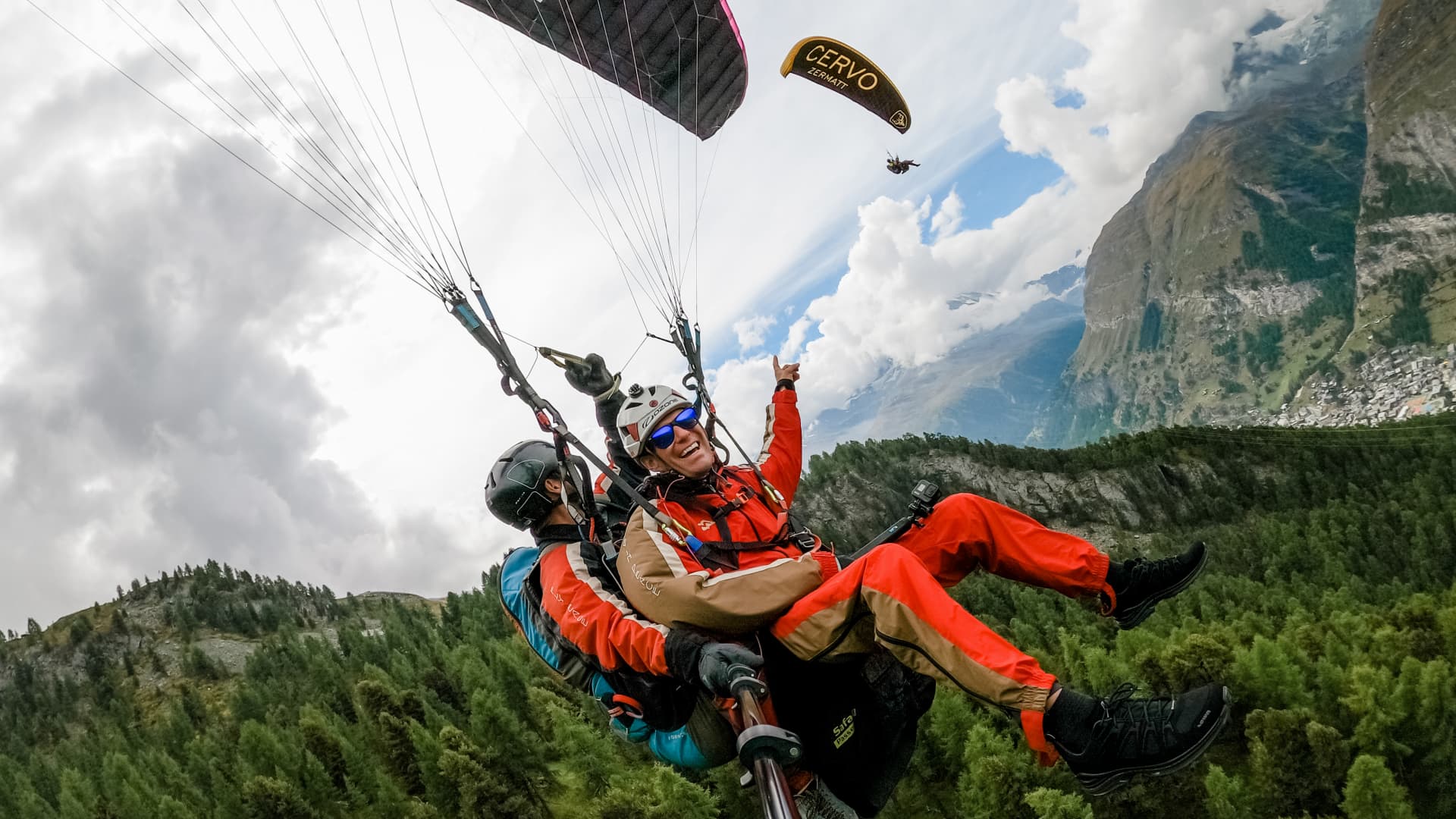 Hudson and Emily Crider paragliding in Switzerland.