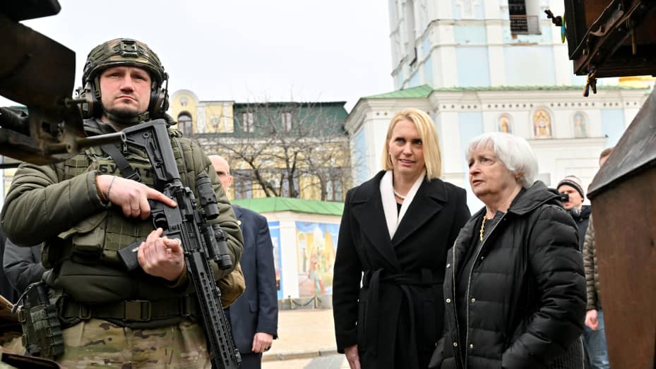 US Secretary of the Treasury Janet Yellen (R) and US ambassador to Ukraine Bridget Brink look at destroyed Russian military vehicles displayed in an open air exhibition during their visit to Kyiv on February 27, 2023, amid the Russian invasion of Ukraine.