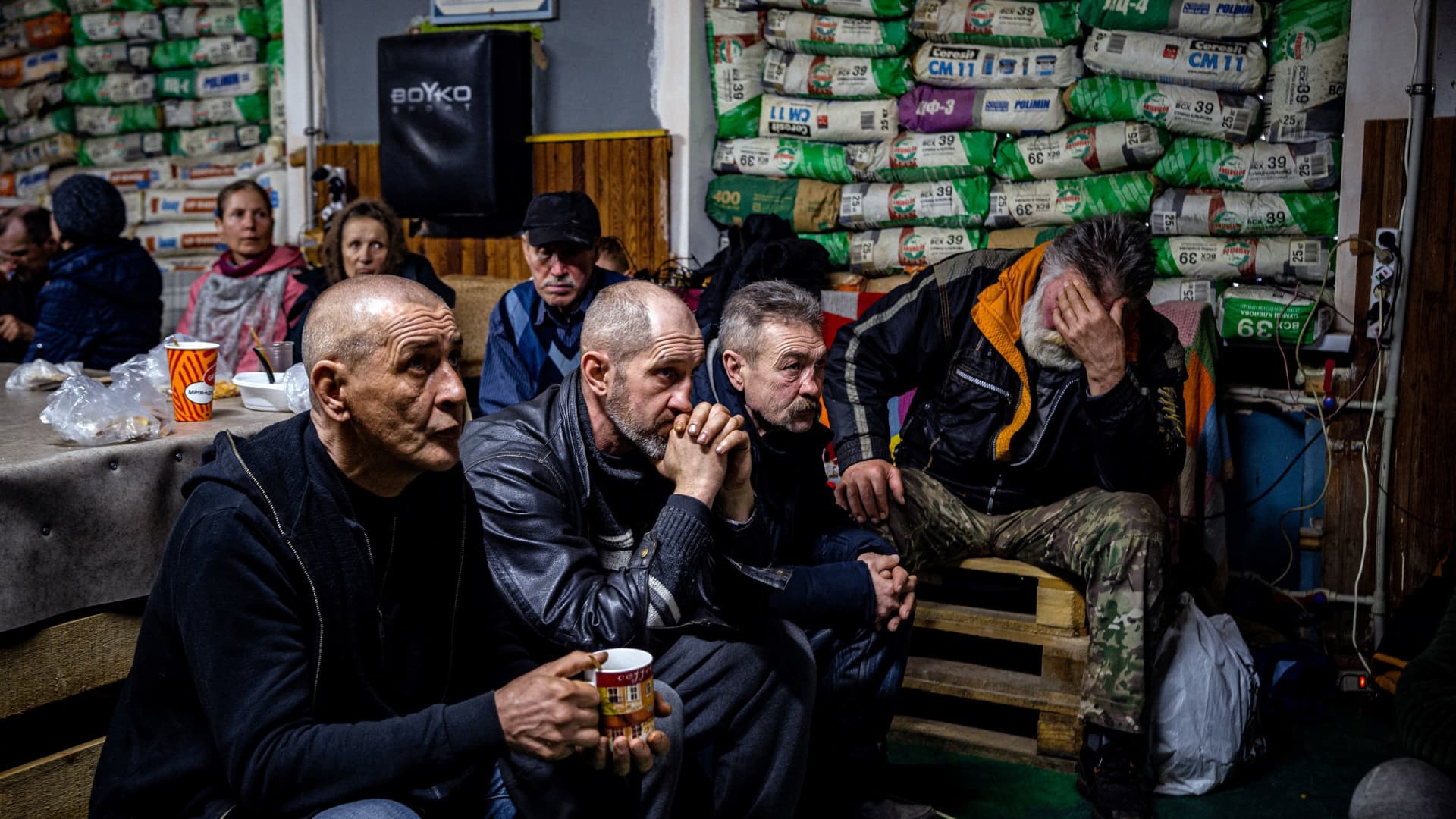 Ukrainians watching a movie on TV at a humanitarian aid center in Bakhmut on Feb. 27, 2023 amid the Russian invasion of Ukraine.