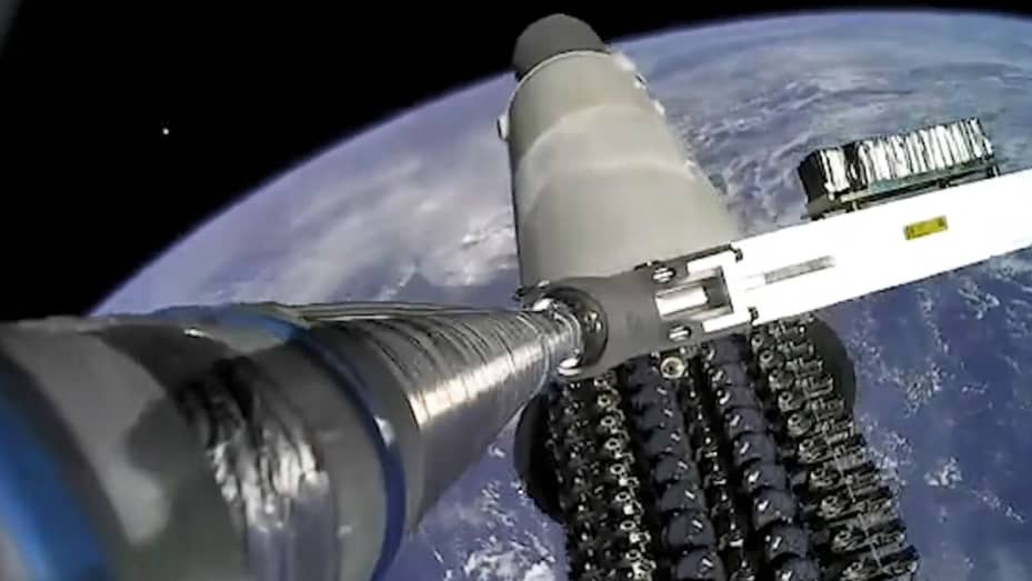 The upper stage of a Falcon 9 rocket deploys a stack of Starlink "V2 Mini" satellites in orbit on Feb. 27, 2028.