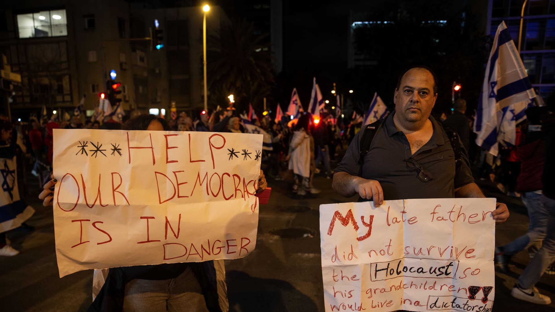 People stage protest against Israeli Prime Minister Benjamin Netanyahu's bill that restricts the powers of the judiciary and his right-wing policies at the Dizengoff Square in Tel Aviv, Israel on February 25, 2023.