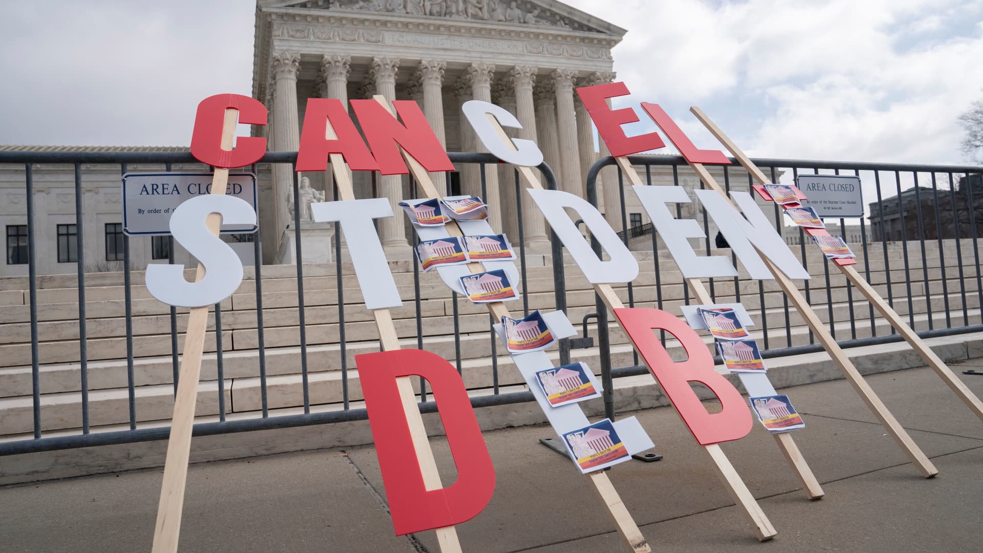 A sign calling for student loan debt relief is seen in front of the Supreme Court as the justices are scheduled to hear oral arguments in two cases involving President Joe Biden's bid to reinstate his plan to cancel billions of dollars in student debt in Washington, U.S., February 28, 2023. 
