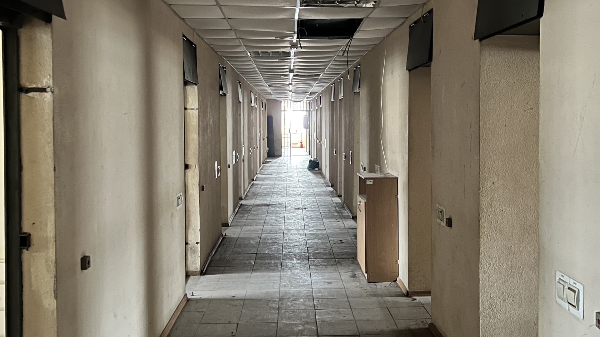 A photo of a hallway in a building where Russian forces established a torture center in Kherson.