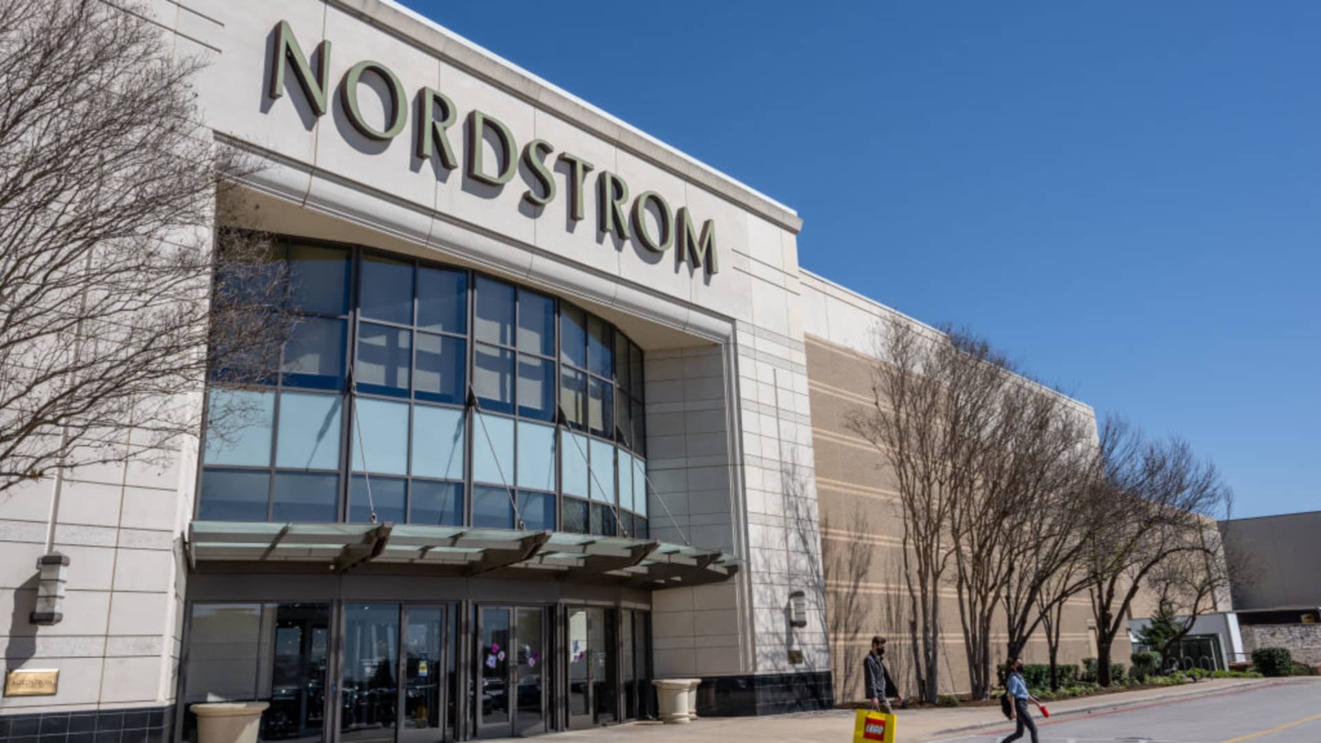 Shoppers in front of a Nordstrom department store in Austin, Texas, on March 3, 2023.