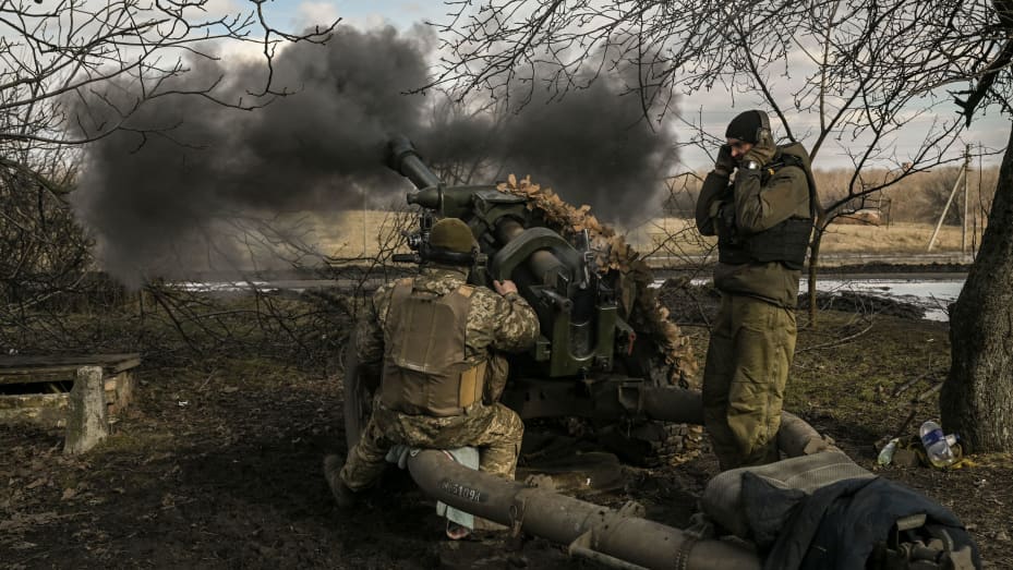 Ukrainian servicemen fire a 105mm Howitzer towards Russian positions, near the city of Bakhmut, on March 4, 2023.