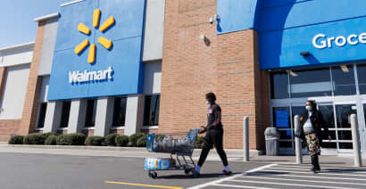 Walmart raises full-year guidance, as earnings beat on boost from grocery