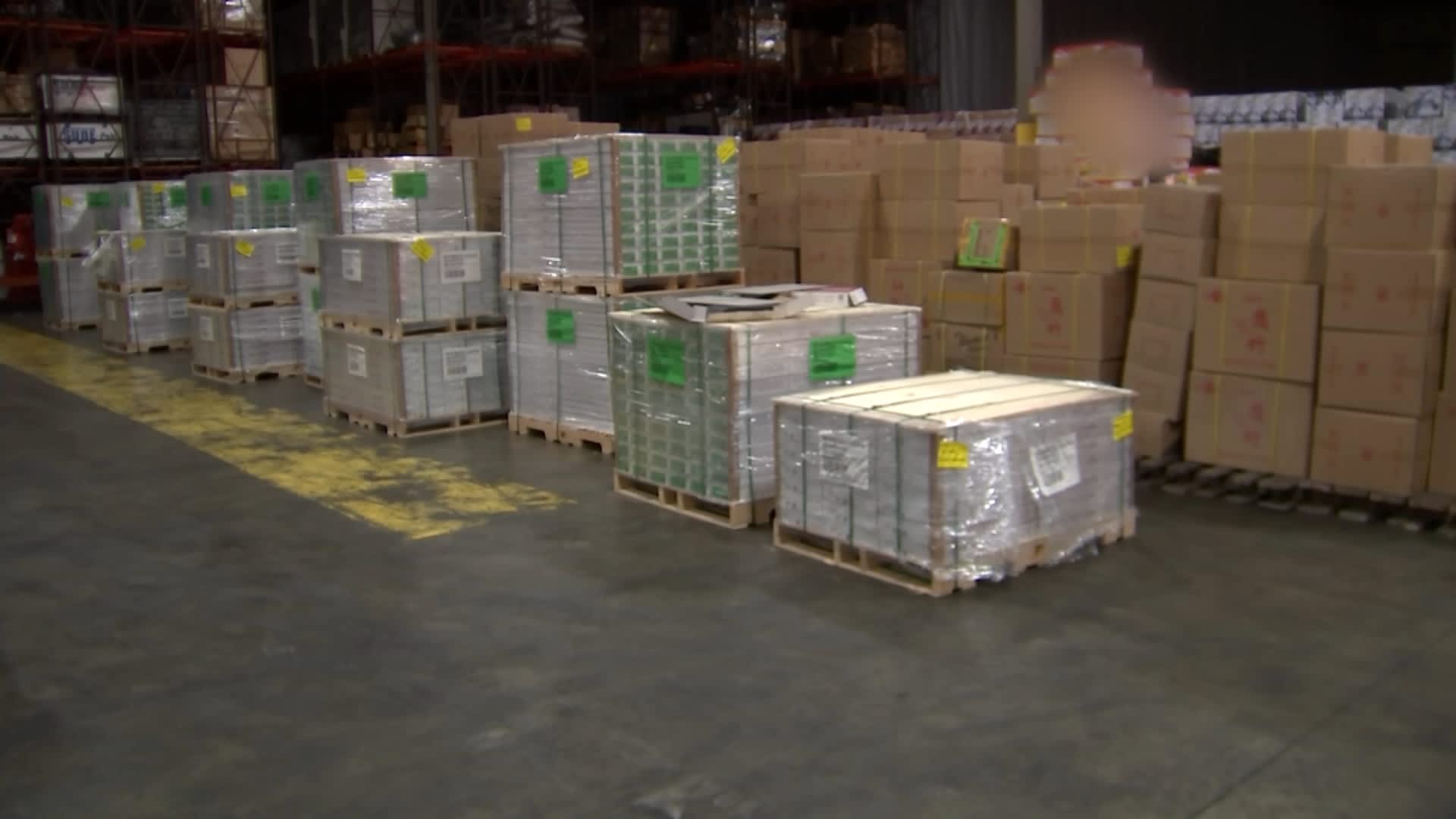 During CNBC's port visit, a 40-foot shipping container full of floor tiles (white boxes) was detained by U.S. Customs & Border Protection over suspected ties to forced labor.
