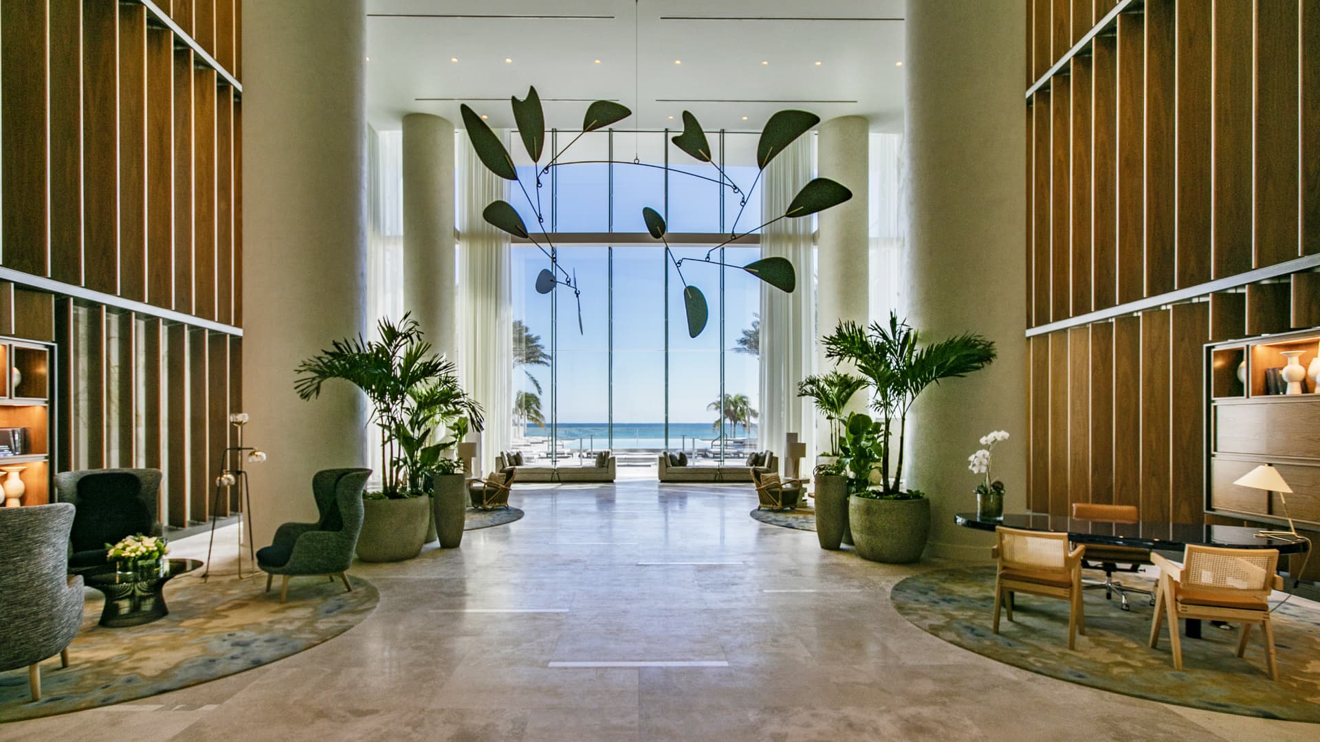 The grand lobby with views across the pool and ocean.