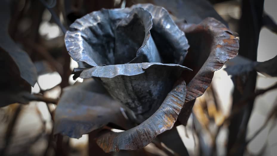 A rose transformed from weapons and ammunition into flowers of war by hands of Viktor Mikhalev is on display in a workshop in his house in Donetsk, Russian-controlled Donetsk region, eastern Ukraine, Saturday, March 4, 2023. 