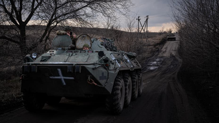 CHASIV YAR, DONBAS REGION, UKRAINE, MARCH 8: Ukrainian servicemen load an armoured vehicle before deployed to the frontline of Bakhmut, in Chasiv Yar, Donetsk, Ukraine, March 8 2023. The small village of Chasiv Yar, only 5km from Bakhmut, is one of the last towns around the city still under control by the Ukranian cities. As so, it has become a hub for resupply and the movement of troops. It has suffered several attacks by Russian artillery in the last days. (Photo by Ignacio Marin/Anadolu Agency via Getty 