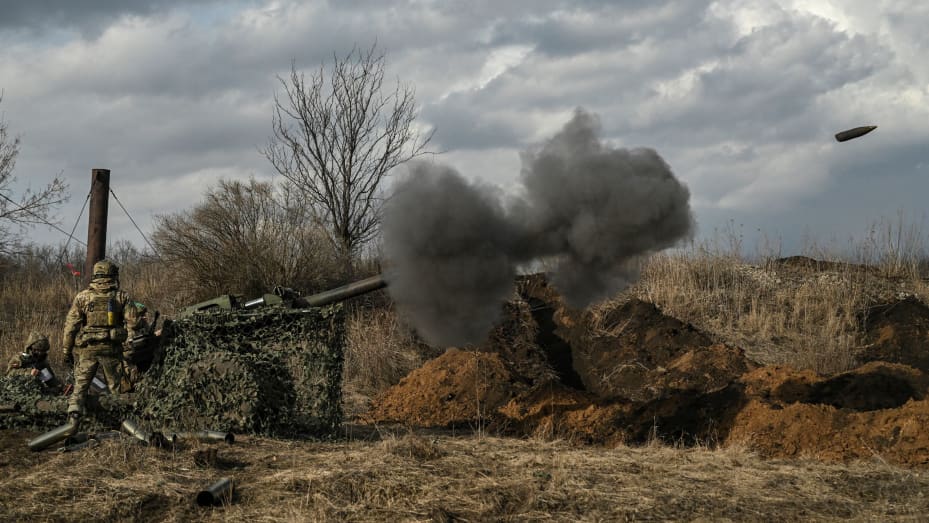 TOPSHOT - Ukrainian servicemen fire with a 105mm howitzer towards Russian positions near the city of Bakhmut, on March 8, 2023, amid the Russian invasion of Ukraine. (Photo by Aris Messinis / AFP) (Photo by ARIS MESSINIS/AFP via Getty Images)