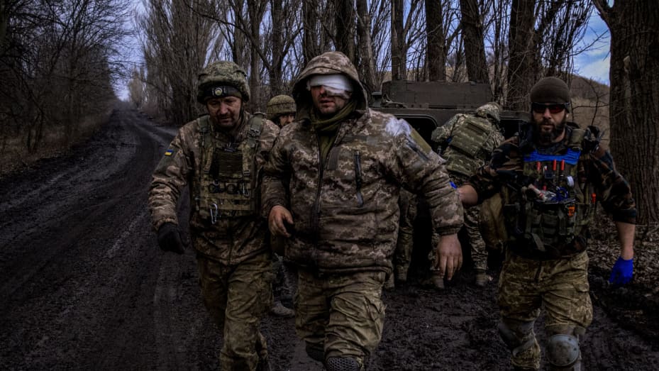 Ukrainian combat medics evacuate a wounded Ukrainian servicem?n from the front line near Bakhmut, on March 8, 2023, amid the Russian invasion of Ukraine.