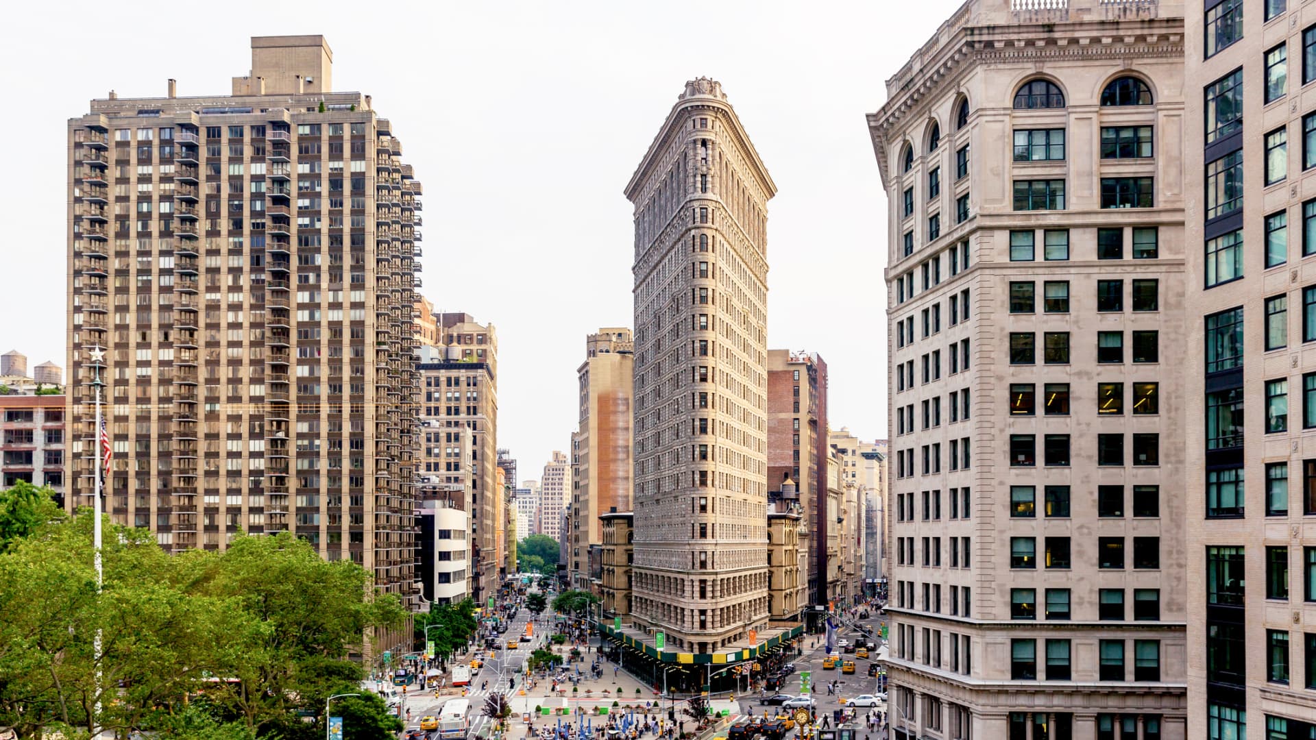 The Flatiron Building was designed by Daniel Burnham and Frederick Dinkelberg and completed in 1902.