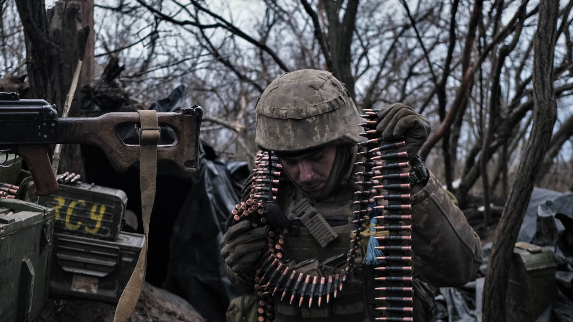 A soldier of the Ukrainian Volunteer Army prepares ammunition to fire at Russian front line positions near Bakhmut, Donetsk region, on March 11, 2023, amid the Russian invasion of Ukraine.
