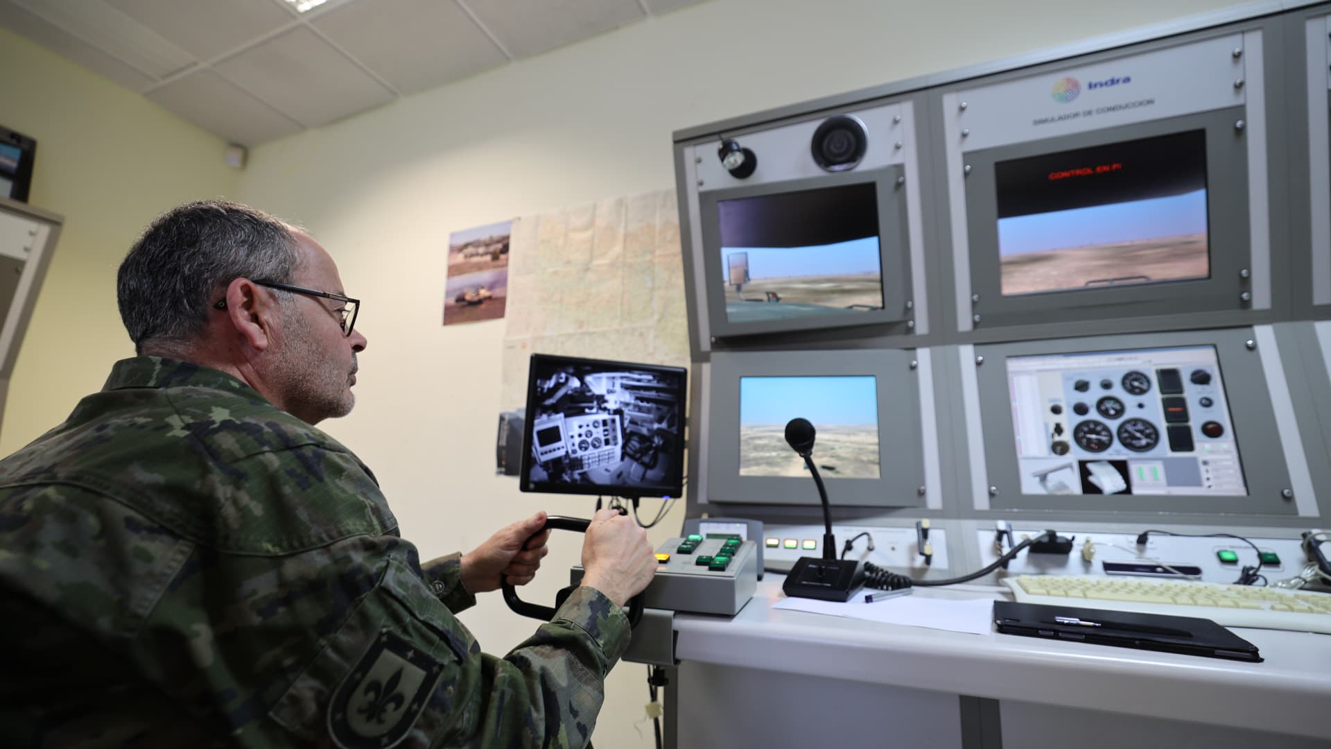 An Armed Forces soldier watches a simulation on a screen during the presentation of the Spanish Armed Forces training to Ukrainian soldiers at the San Gregorio Training Center, on 13 March, 2023 in Zaragoza, Aragon, Spain. 