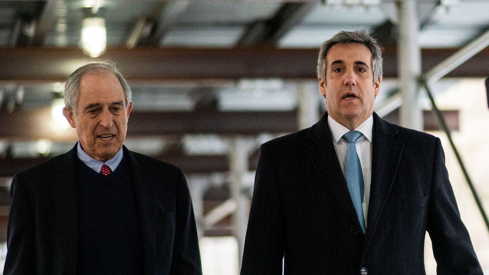 Michael Cohen, former attorney for former U.S. President Donald Trump, with his lawyer Lanny Davis, arrives to the New York Courthouse in New York City, U.S., March 13, 2023.