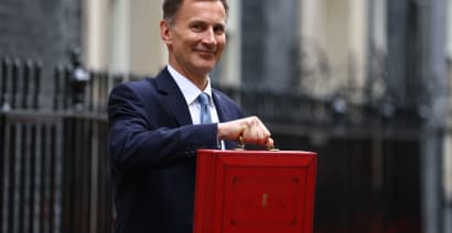 UK's Jeremy Hunt delivers major tax cut as growth forecast is downgraded
