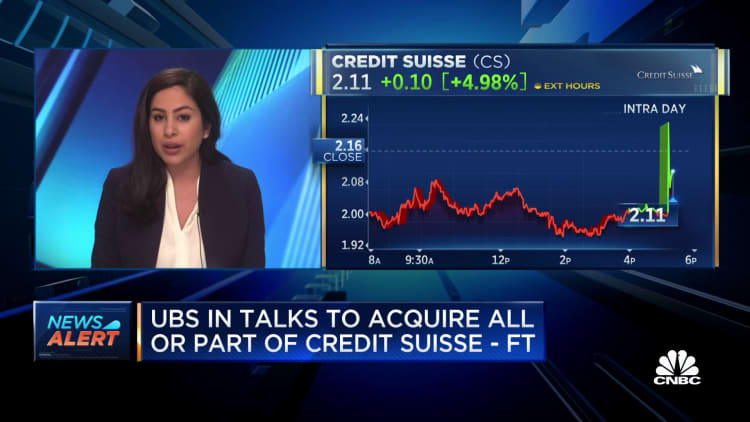UBS is in talks to acquire all or part of Credit Suisse