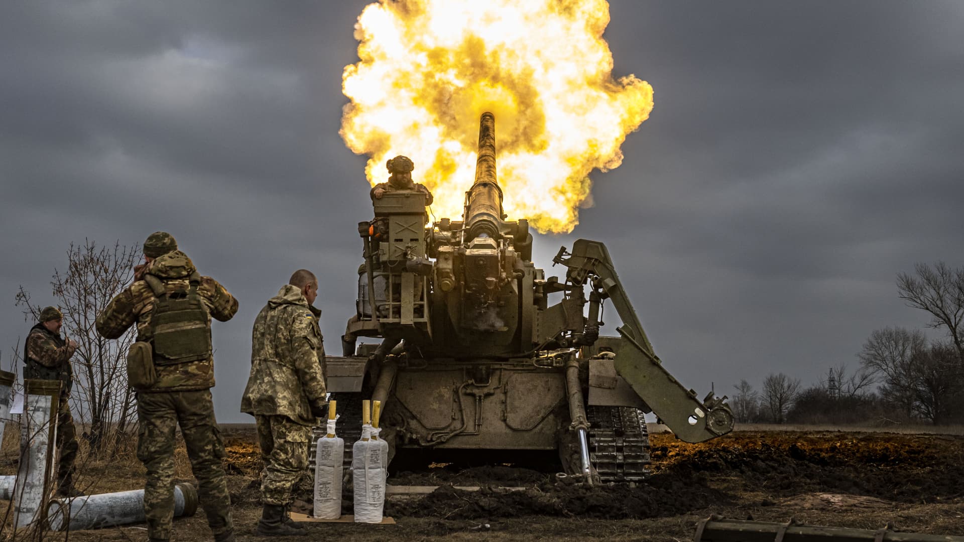Ukrainian servicemen fire an artillery called 2S7 Pion howitzer cannon aiming to Russian positions in the frontline nearby Bakhmut in Chasiv Yar, Ukraine on March 17, 2023. 