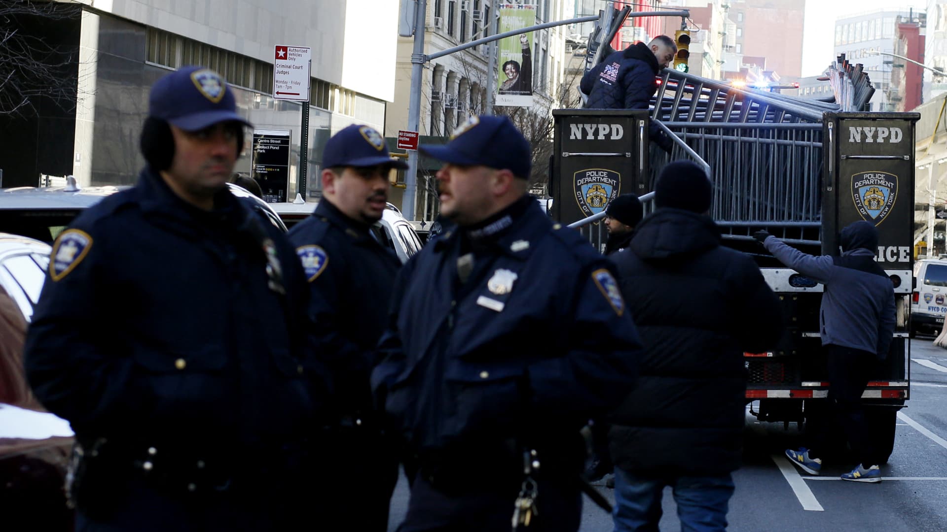 Officers with the New York Police Department set up barricades outside the Manhattan District Attorney's office in New York City on March 20, 2023.