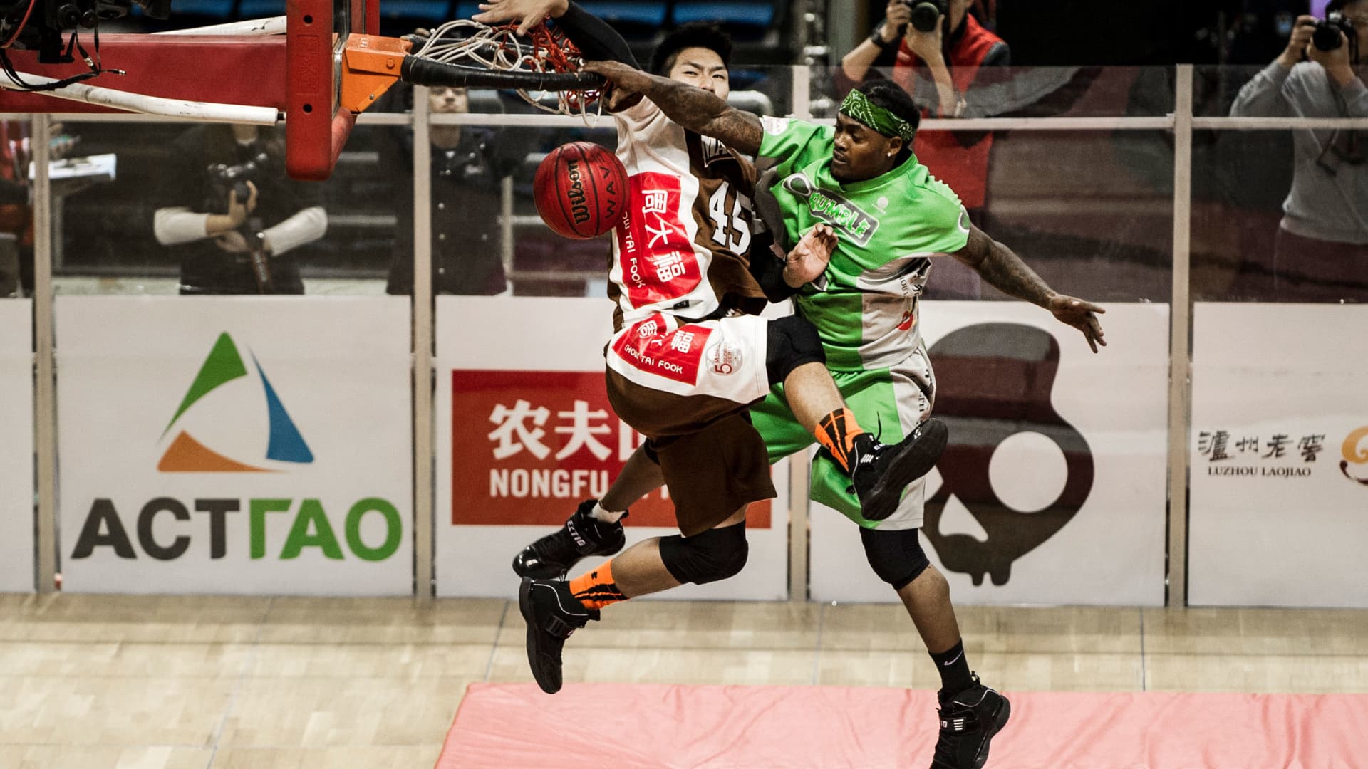 SlamBall, which mixes basketball and soccer with trampolines, snags huge traders