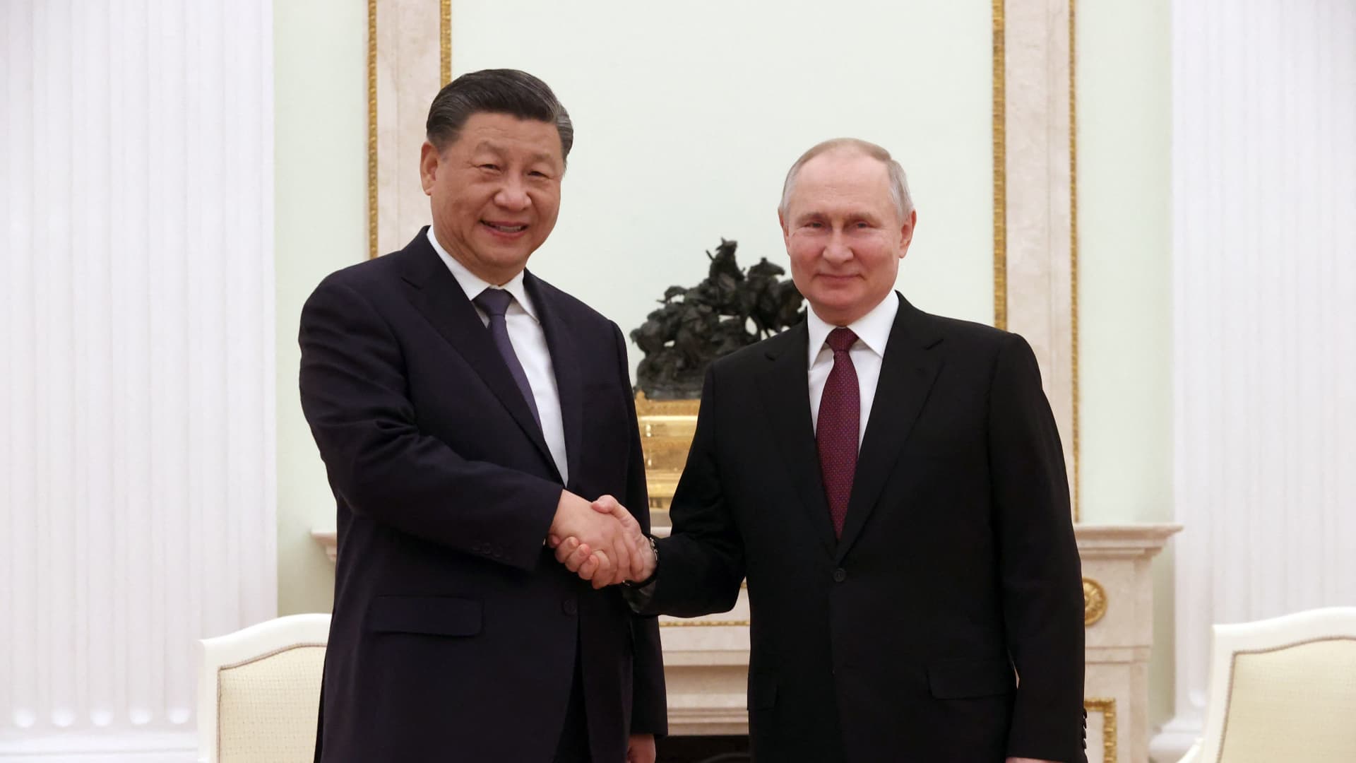 TOPSHOT - Russian President Vladimir Putin meets with China's President Xi Jinping at the Kremlin in Moscow on March 20, 2023. (Photo by Sergei KARPUKHIN / SPUTNIK / AFP) (Photo by SERGEI KARPUKHIN/SPUTNIK/AFP via Getty Images)
