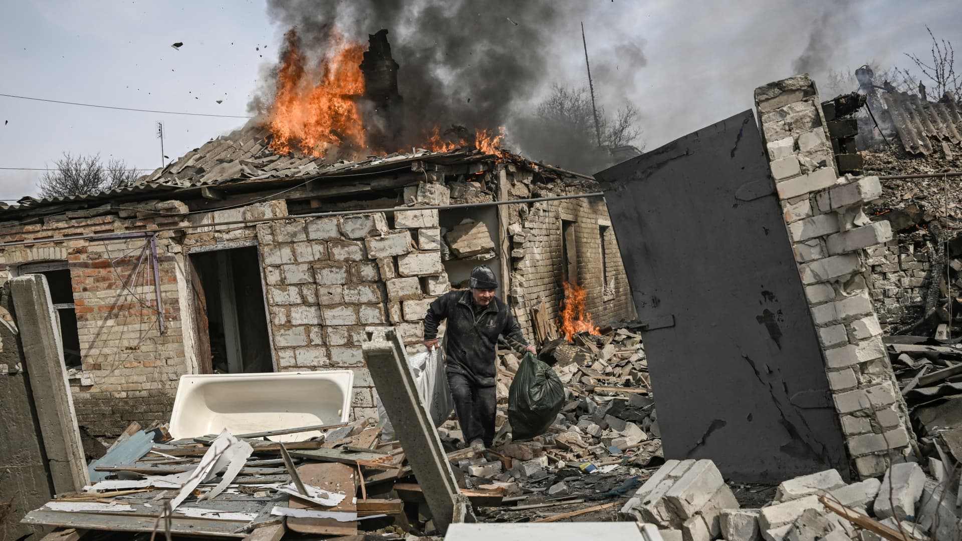 A house burns after shelling in the town of Chasiv Yar, near Bakhmut, on March 21, 2023.