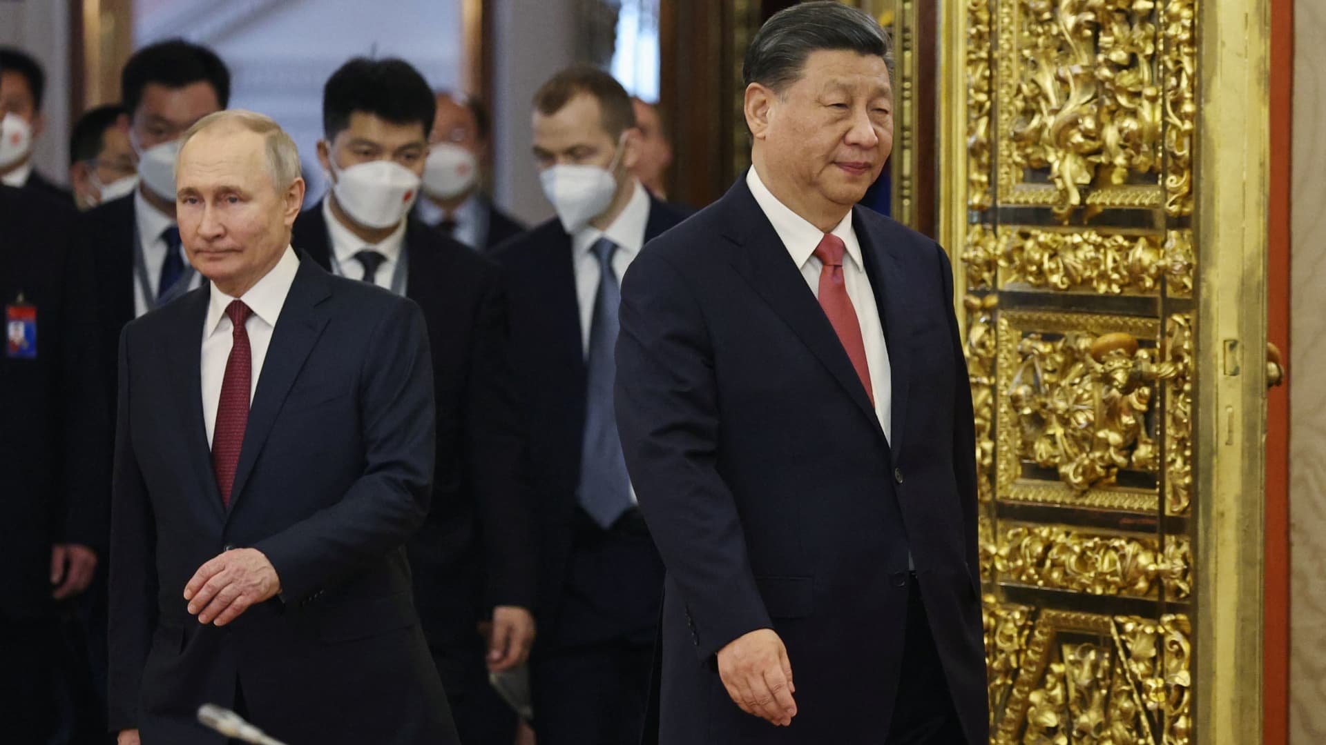 Russian President Vladimir Putin and Chinese President Xi Jinping attend a welcome ceremony before Russia-China talks in Moscow, Russia, on March 21, 2023. Analysts are generally skeptical about China's positioning of itself as a mediator and its ability to help bring an end to the war, questioning how much sway Beijing has over Moscow.
