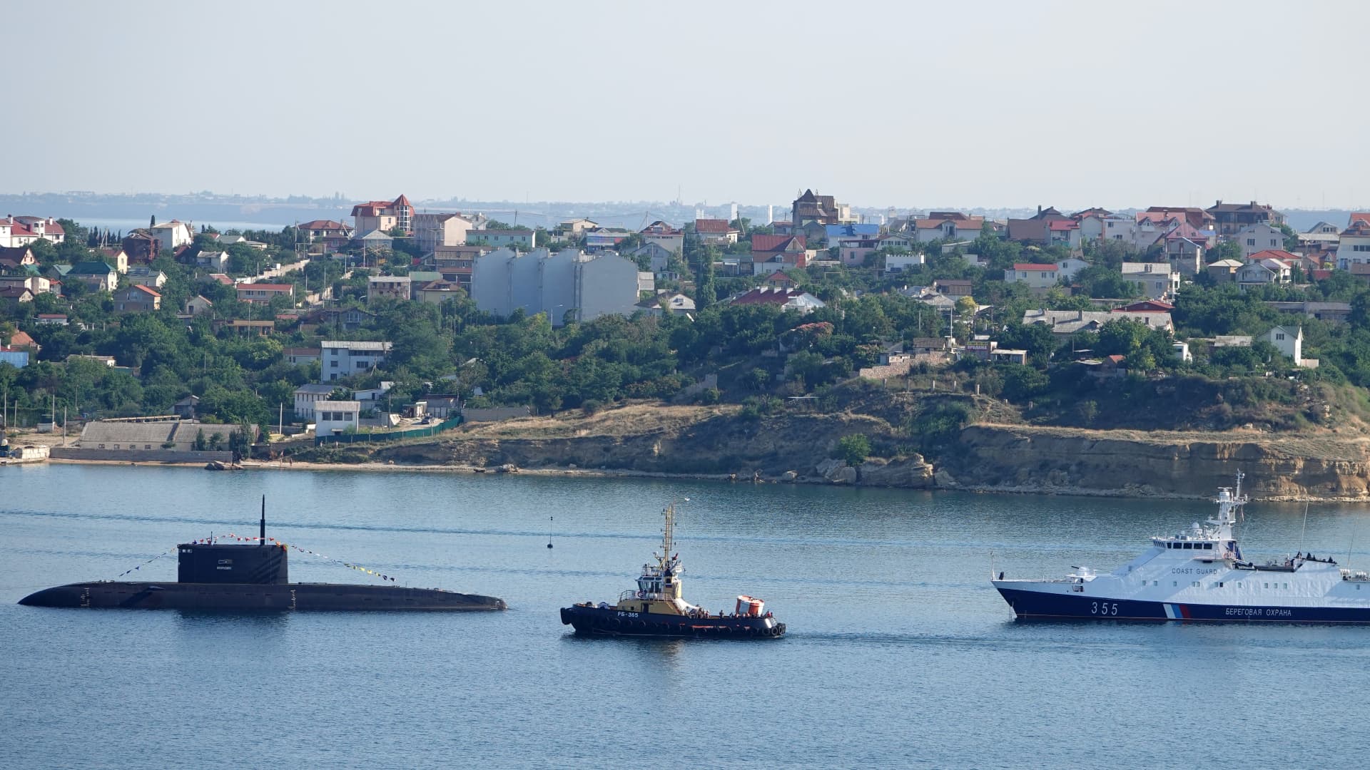 A submarine and warships of the Russian Black Sea Fleet at anchor in the port city of Sevastopol in 2019.