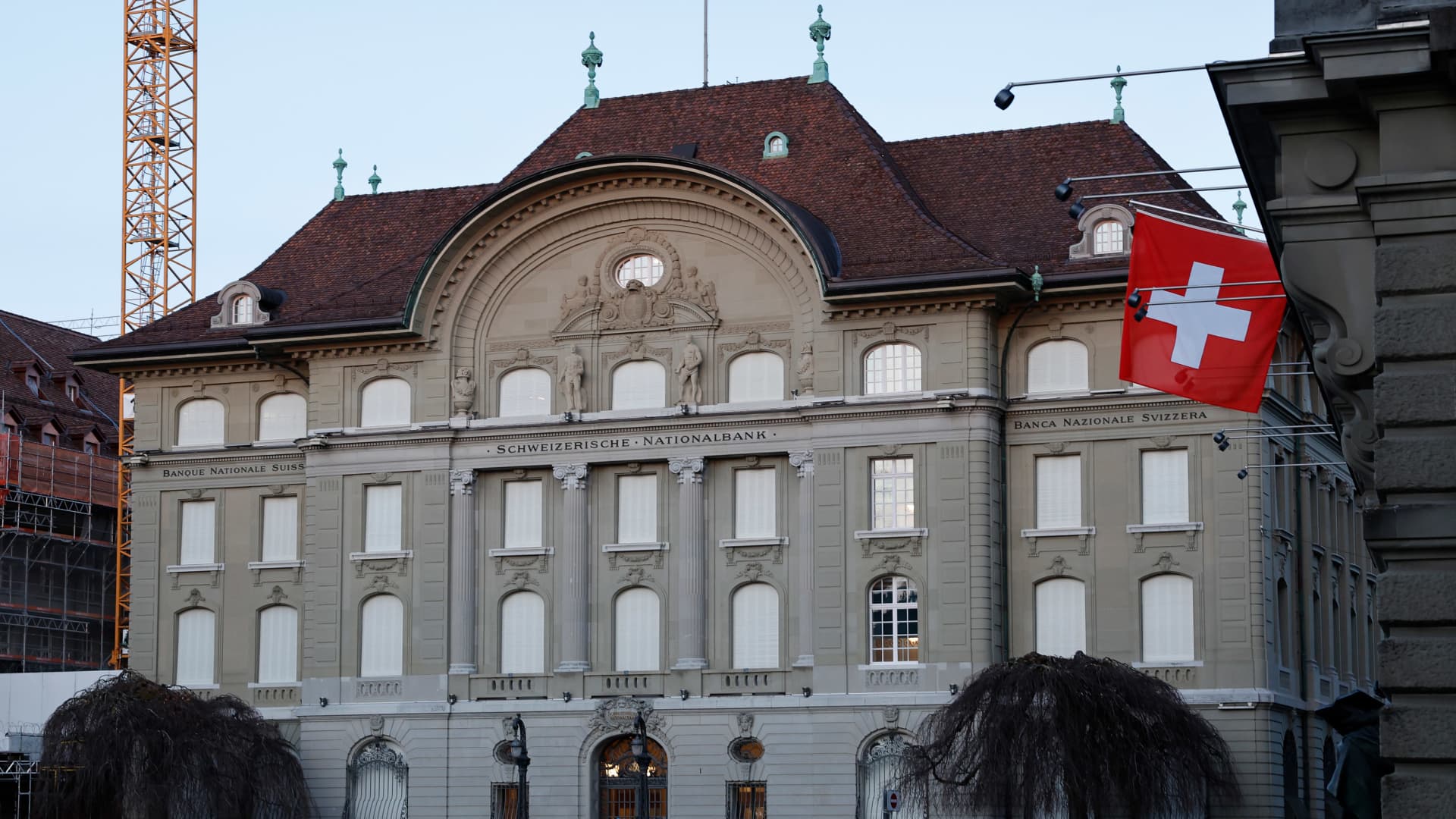 Swiss National Bank opts for smaller rate hike, but says more are likely