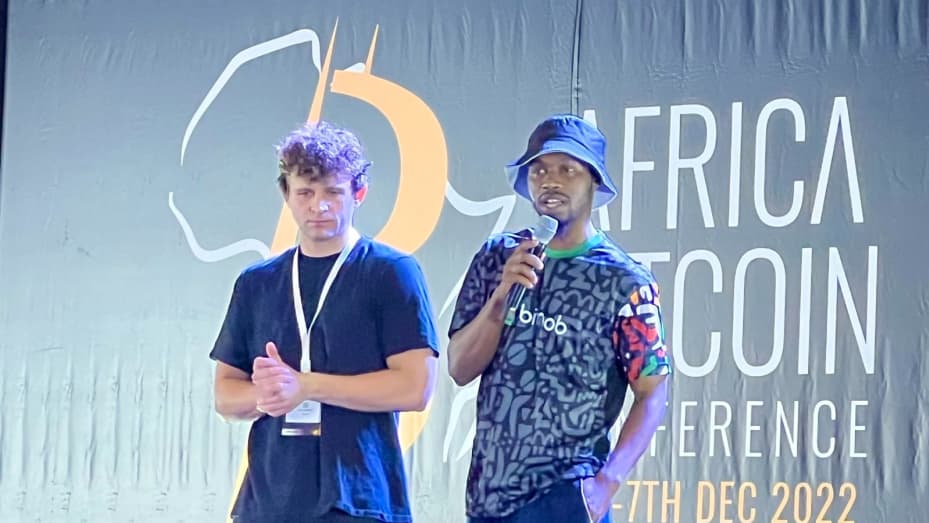 Bitnob CEO Bernard Parah and Strike CEO Jack Mallers announcing the launch of 'Send Globally' on stage at the Africa Bitcoin Conference in Accra, Ghana.