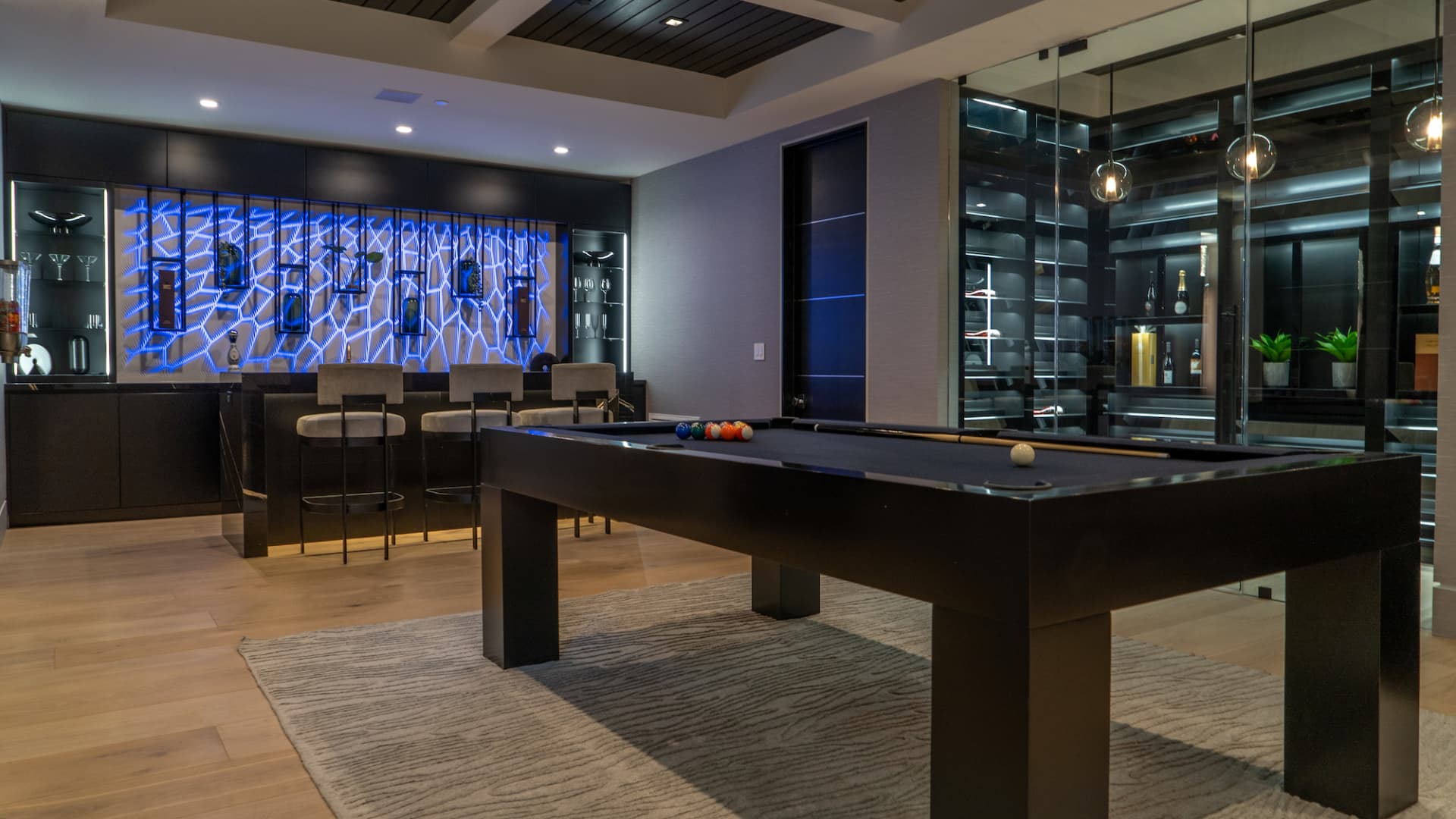 A bar, billiards table and 250-bottle wine cellar on the home's lowest level.