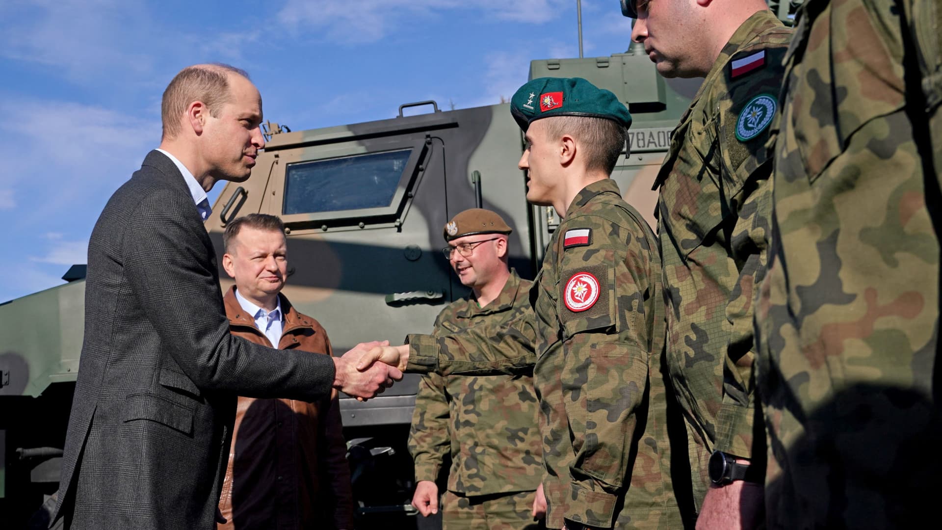 The Prince of Wales (left) meeting members of the Polish military with Polish Deputy Prime Minister and Minister of National Defence, Mariusz Blaszczak (second left) during a visit to the 3rd Brigade Territorial Defence Force base, in Rzeszow, Poland, that has been heavily involved in providing support to Ukraine. March 22, 2023. 