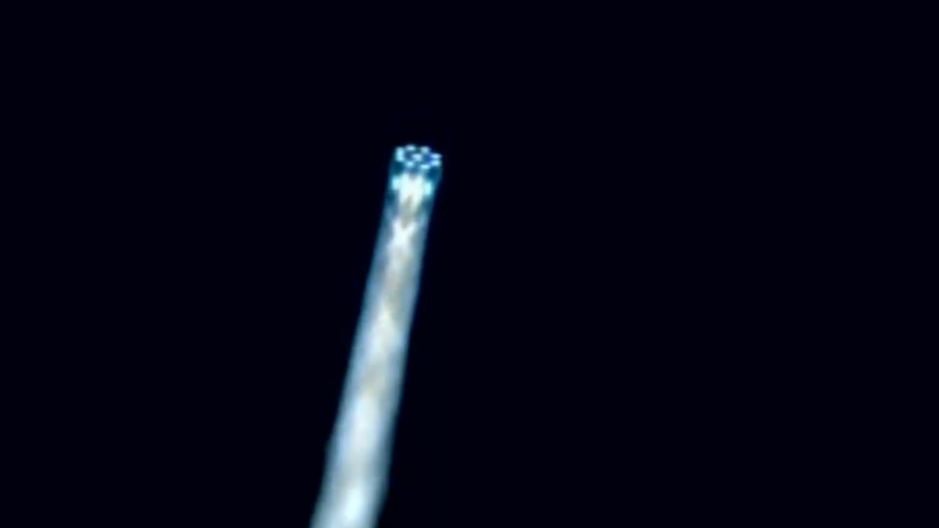 The blue flames of the Terran 1 rocket, which is powered by a mixture of liquid methane and liquid oxygen (or methalox), as it launched.