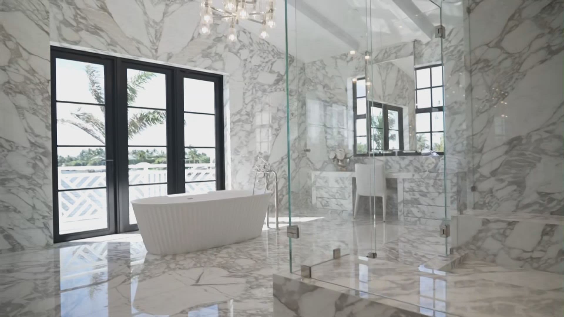 A waterfront bathroom inside the main home on Tarpon Isle, a private island in Palm Beach, Florida, on sale for $218 million.