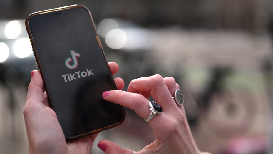 DENVER, CO - MARCH 28 : Amanda Bittner displays TikTok logo on her cellphone in front of Union Station in Denver, Colorado on Tuesday, March 28, 2023. (Photo by Hyoung Chang/The Denver Post)