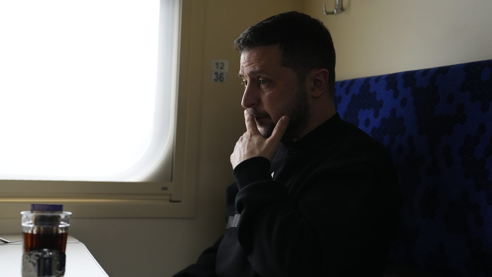 Ukrainian President Volodymyr Zelenskyy pauses during an interview with Julie Pace, senior vice president and executive editor of The Associated Press, on a train traveling from the Sumy region to Kyiv, Ukraine, Tuesday March 28, 2023.