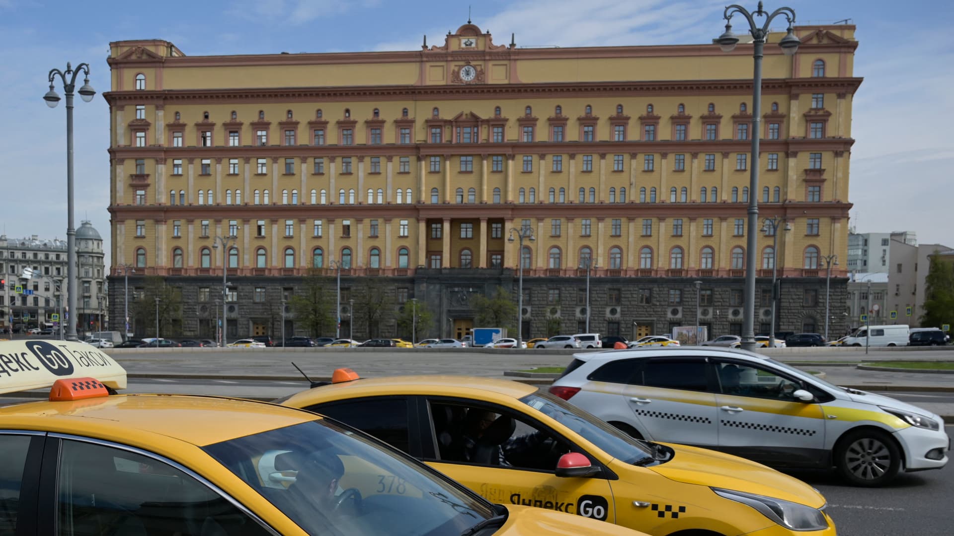 Taxis move past the headquarters of Russia's Federal Security Services (FSB) in central Moscow on May 12, 2022.