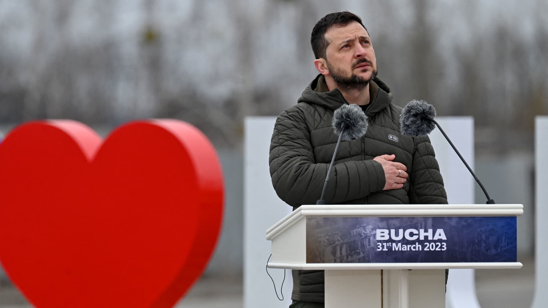 Ukrainian President Volodymyr Zelensky attends a ceremony marking the first anniversary of the retreat of Russian troops from the Ukrainian town of Bucha, in Bucha, near Kyiv, on March 31, 2023. 
