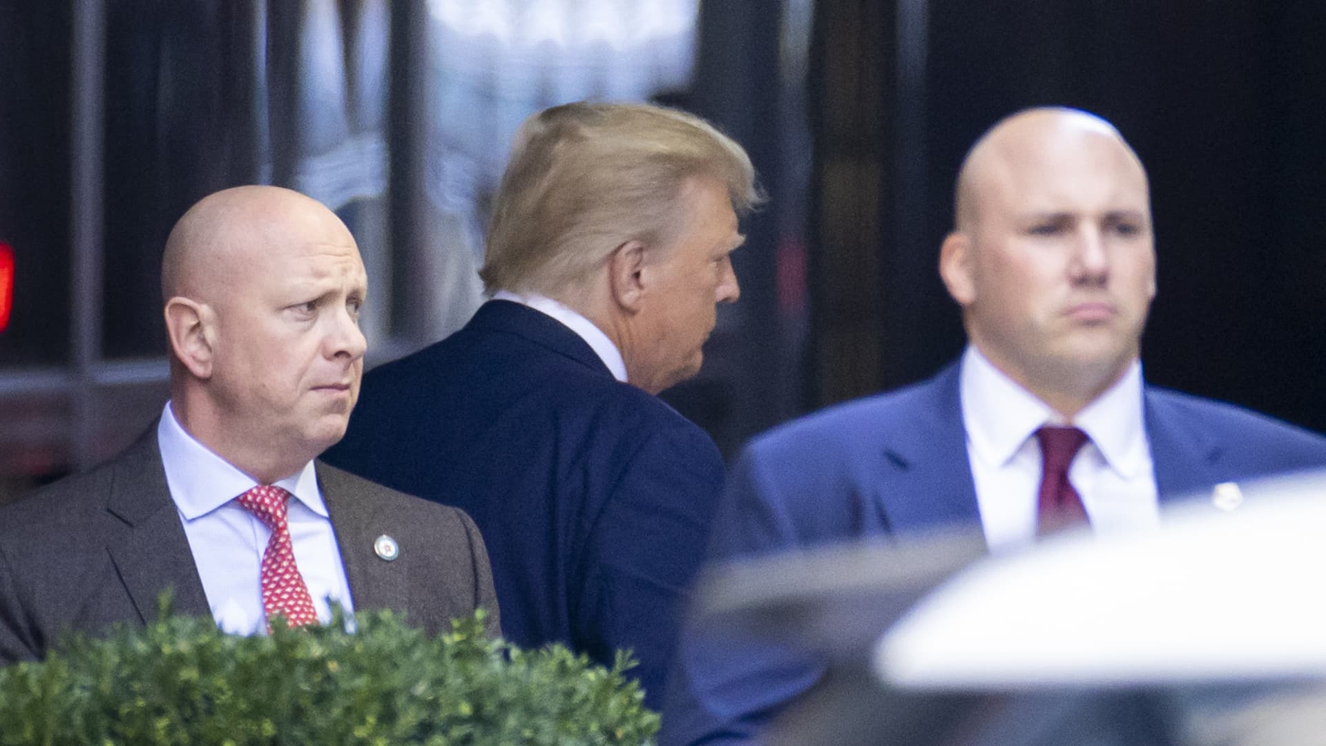 Former President Trump leaves Trump Tower for Manhattan Criminal Court in New York on Tuesday, April 4, 2023. Trump will be booked and arraigned on charges arising from hush money payments during his 2016 campaign.