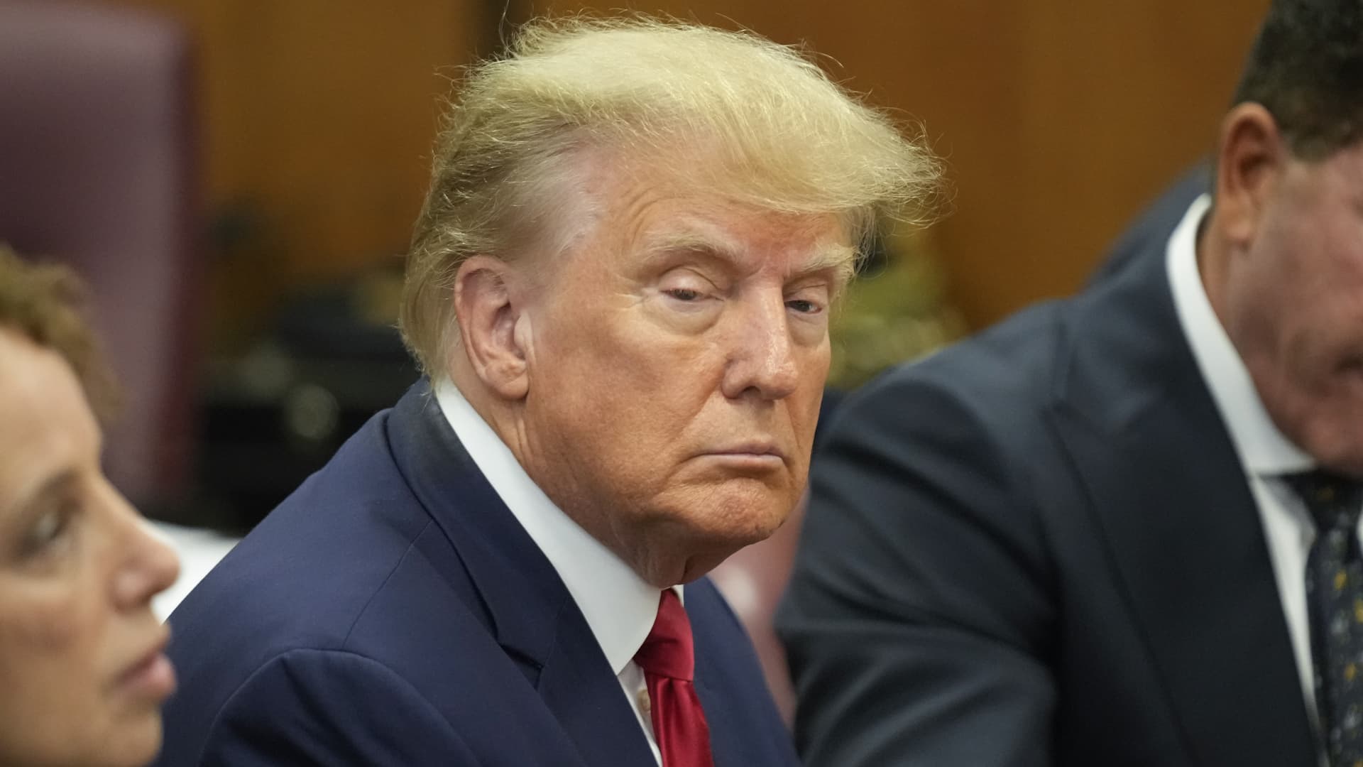 Former President Donald Trump appears in court for his arraignment, Tuesday, April 4, 2023, in New York. Trump surrendered to authorities ahead of his arraignment on criminal charges stemming from a hush money payment to a porn actor during his 2016 campaign. 
