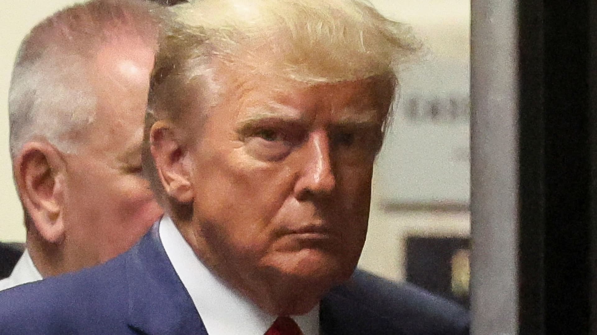 Former U.S. President Donald Trump arrives at Manhattan Criminal Courthouse, after his indictment by a Manhattan grand jury following a probe into hush money paid to porn star Stormy Daniels, in New York City, U.S., April 4, 2023. 